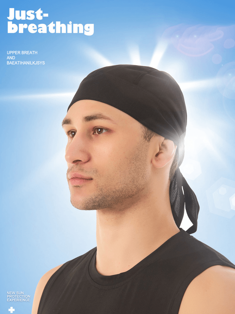 Man wearing a black quick-dry cycling cap with UV protection against a blue sky background.